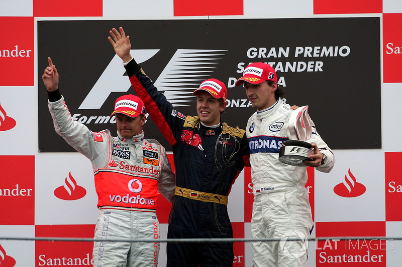 Podium: race winner Sebastian Vettel, Scuderia Toro Rosso, second place Heikki Kovalainen, McLaren, third place Robert Kubica, BMW Sauber F1