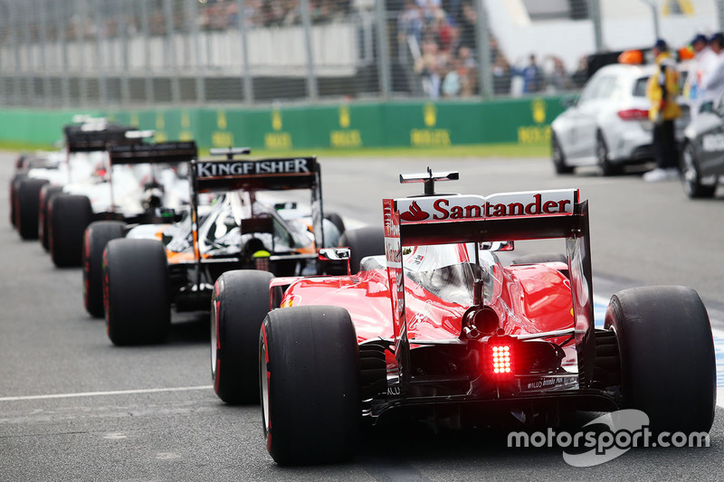 Sebastian Vettel, Ferrari SF16-H joins the queue at the pit lane exit