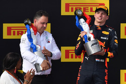Max Verstappen, Red Bull Racing celebrates on the podium with the trophy