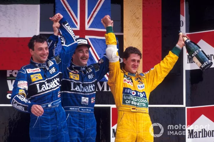 Podio: segundo Riccardo Patrese, Williams, ganador Nigel Mansell, Williams, tercero Michael Schumacher, Benetton