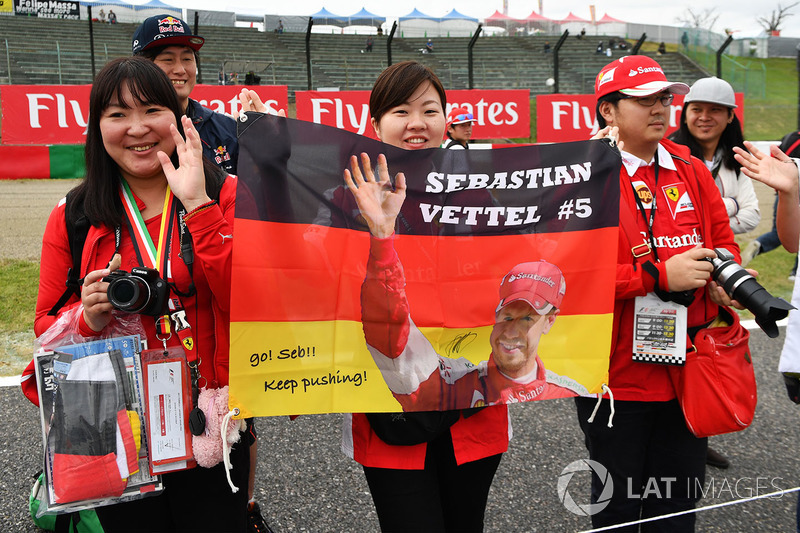 Sebastian Vettel, Ferrari fans and banner