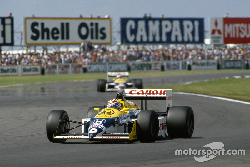 Nelson Piquet, Williams FW11B, leads Nigel Mansell, Williams FW11B