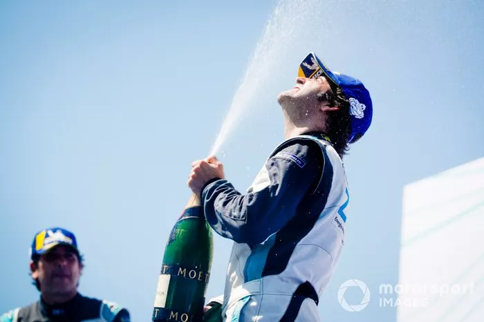 Race winner Sérgio Jimenez, Jaguar Brazil Racing celebrates with the champagne on the podium