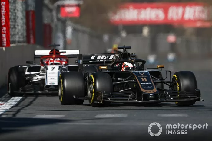 Romain Grosjean, Haas F1 Team VF-19, Kimi Raikkonen, Alfa Romeo Racing C38