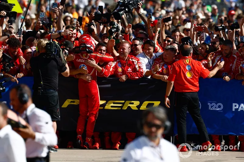 Charles Leclerc, Scuderia Ferrari, 1st position, celebrates with his team in Parc Ferme