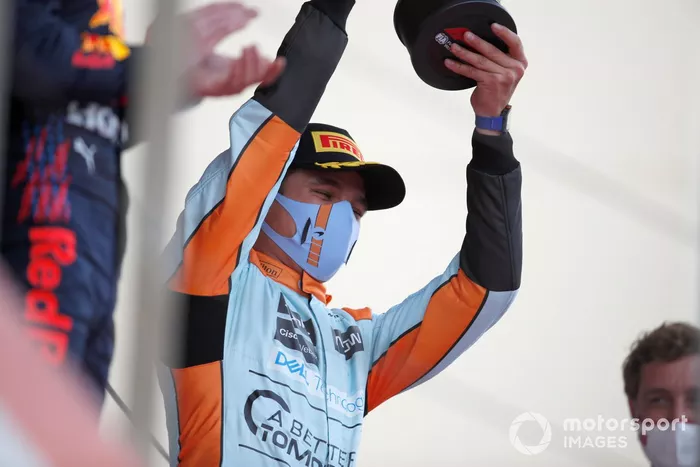 Lando Norris, McLaren, 3rd position, lifts his trophy