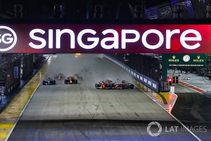 Sebastian Vettel, Ferrari SF70H, Max Verstappen, Red Bull Racing RB13, Kimi Raikkonen, Ferrari SF70H, collide at the start