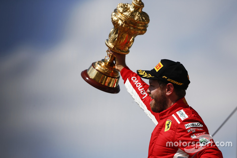 Sebastian Vettel, Ferrari, celebrates on the podium