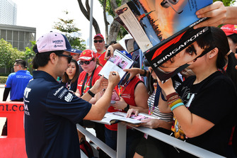 Sergio Perez, Racing Point Force India F1 Team signs autographs for the fans
