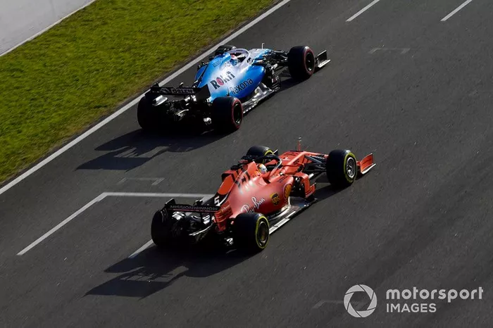 George Russell, Williams FW42, leads Sebastian Vettel, Ferrari SF90 