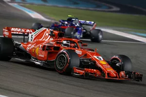 Sebastian Vettel, Ferrari SF71H and Pierre Gasly, Scuderia Toro Rosso STR13 