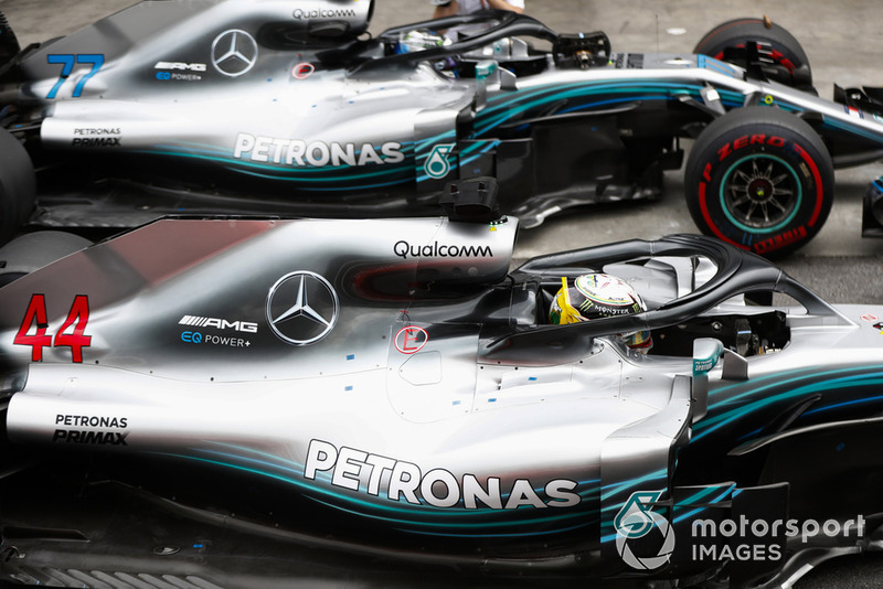 Lewis Hamilton, Mercedes AMG F1, celebrates pole position in parc ferme alongside Valtteri Bottas, Mercedes AMG F1 W09.