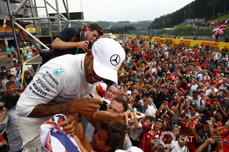 Race winner Lewis Hamilton, Mercedes AMG F1, celebrates with fans after the race