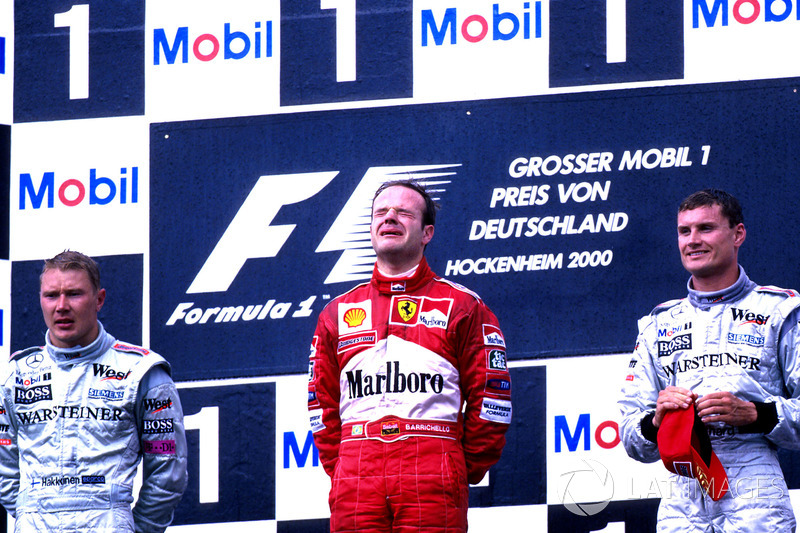 Podium: Race winner Rubens Barrichello, Ferrari F1 2000, second place Mika Hakkinen, Mclaren MP4-15