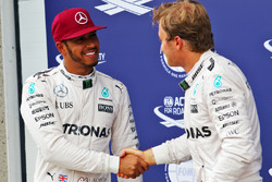 (L to R): Lewis Hamilton, Mercedes AMG F1 celebrates his pole position with third placed team mate N