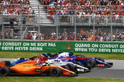 Pierre Gasly, Toro Rosso STR13, Marcus Ericsson, Sauber C37, and Fernando Alonso, McLaren MCL33