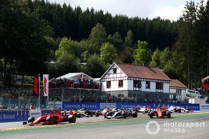 Charles Leclerc, Ferrari SF90, leads Sebastian Vettel, Ferrari SF90, Lewis Hamilton, Mercedes AMG F1 W10 and Valtteri Bottas, Mercedes AMG W10. Kimi Raikkonen, Alfa Romeo Racing C38 has just been tipped into the air by Max Verstappen, Red Bull Racing RB15