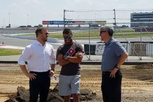 SMI President Marcus Smith, NASCAR driver Bubba Wallace and Charlotte Motor Speedway Executive Vice-President and General Manager Greg Walter