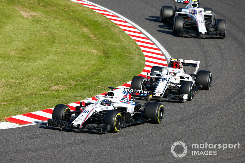 Lance Stroll, Williams FW41, leads Charles Leclerc, Sauber C37, and Sergey Sirotkin, Williams FW41
