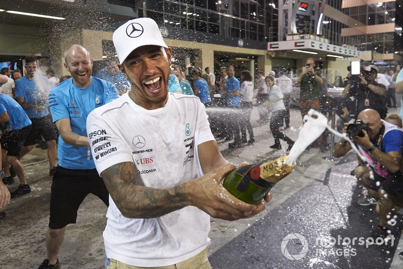 Lewis Hamilton, Mercedes AMG F1, 1st position, celebrates victory in the race, the drivers and the constructors world championships with the Mercedes team