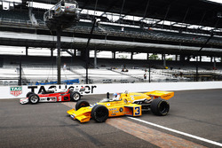 Johnny Rutherford, McLaren M16, and Mario Andretti, McLaren M24