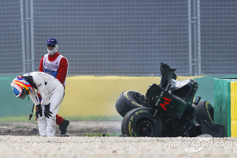 Fernando Alonso, McLaren MP4-31 exits his car after a huge crash