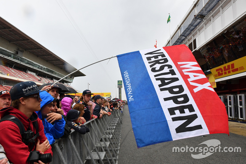 Max Verstappen, Red Bull Racing fans and flag