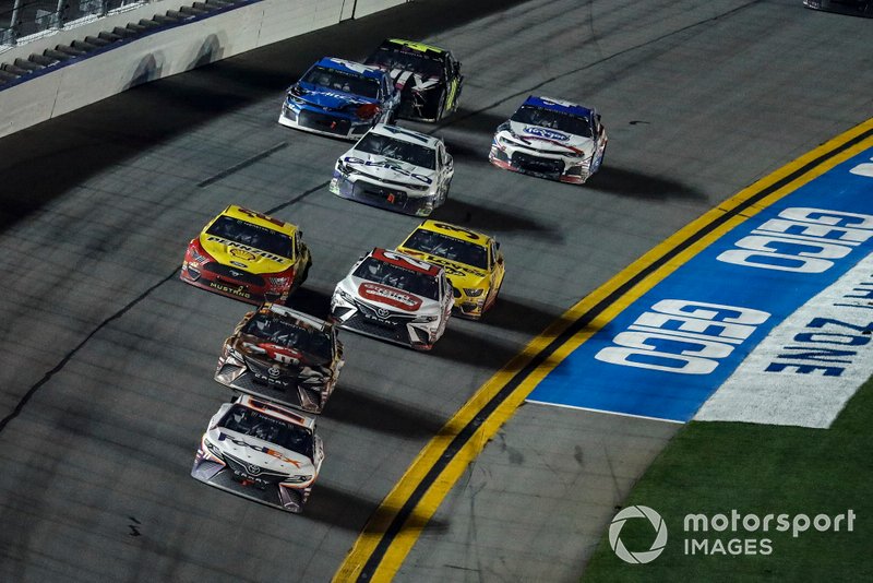 Winner Denny Hamlin, Joe Gibbs Racing, Toyota Camry FedEx Express leads the final few feet before the checkered flag and finish line