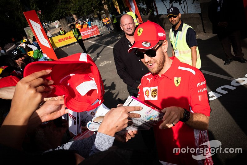 Sebastian Vettel, Ferrari signs autographs for the fans
