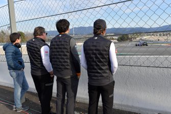 Zak Brown, McLaren Racing CEO, Carlos Sainz Jr., McLaren and Fernando Alonso watch the action trackside