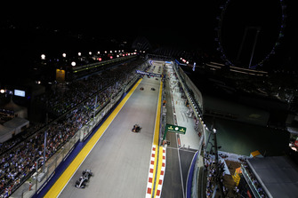 Lewis Hamilton, Mercedes AMG F1 W09 EQ Power+, leads Max Verstappen, Red Bull Racing RB14, Sebastian Vettel, Ferrari SF71H, Valtteri Bottas, Mercedes AMG F1 W09 EQ Power+, and the rest of the field on the formation lap