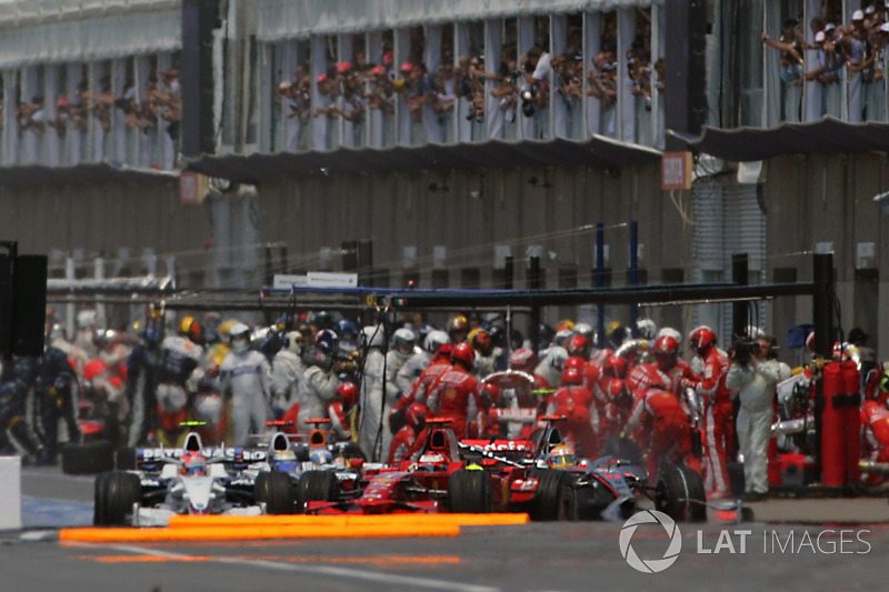 Carnage at the pit lane exit as Lewis Hamilton, McLaren MP4-23, ran into the back of Kimi Raikkonen, Ferrari F2008, and was in turn hit by Nico Rosberg, Williams FW30, upon realisation that the lights at the exit were red