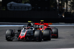 Kevin Magnussen, Haas F1 Team VF-18, Kimi Raikkonen, Ferrari SF71H
