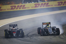 Stoffel Vandoorne, McLaren MP4-31 and Sergio Perez, Sahara Force India F1 VJM09
