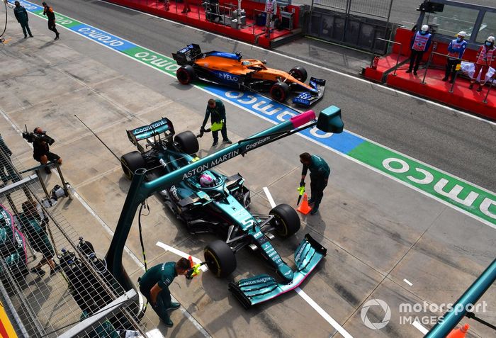 Sebastian Vettel, Aston Martin AMR21, in the pits