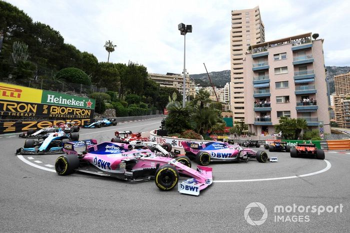 Lance Stroll, Racing Point RP19, Kimi Raikkonen, Alfa Romeo Racing C38, y Sergio Pérez, Racing Point RP19