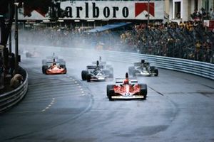 Niki Lauda, Ferrari 312T, leads the field at the start