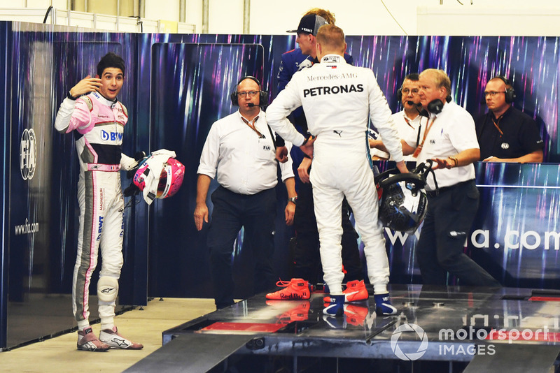 Max Verstappen, Red Bull Racing and Esteban Ocon, Racing Point Force India square up after the race following their on track crash 