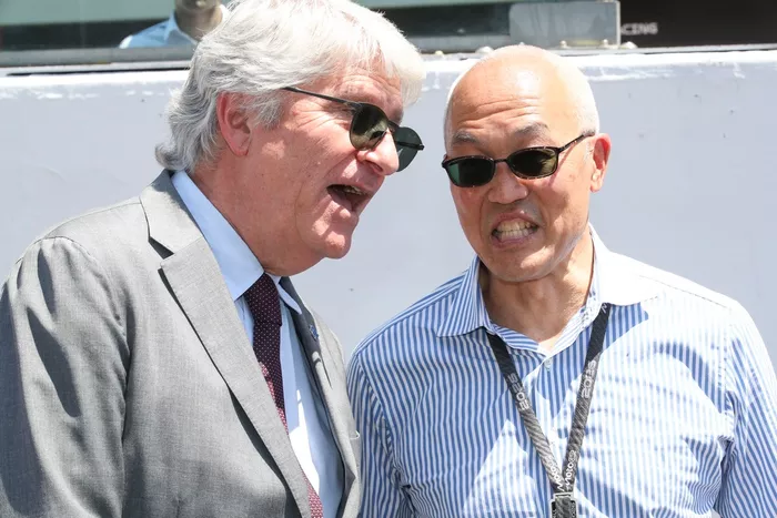 Jorge Viegas, President, FIM, Derek Chang, CEO, Liberty Media, on the grid.