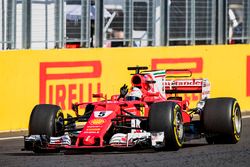 Sebastian Vettel, Ferrari SF70H, race winner, takes the chequered flag