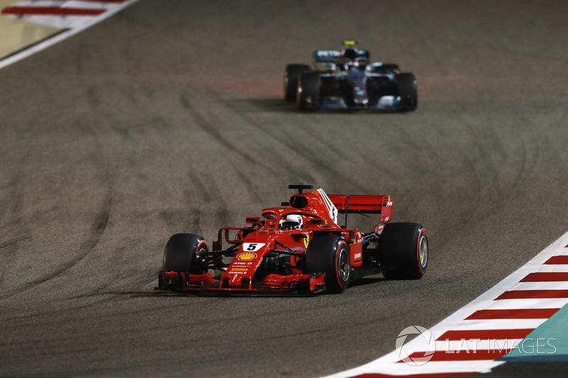 Sebastian Vettel, Ferrari SF71H, leads Valtteri Bottas, Mercedes AMG F1 W09