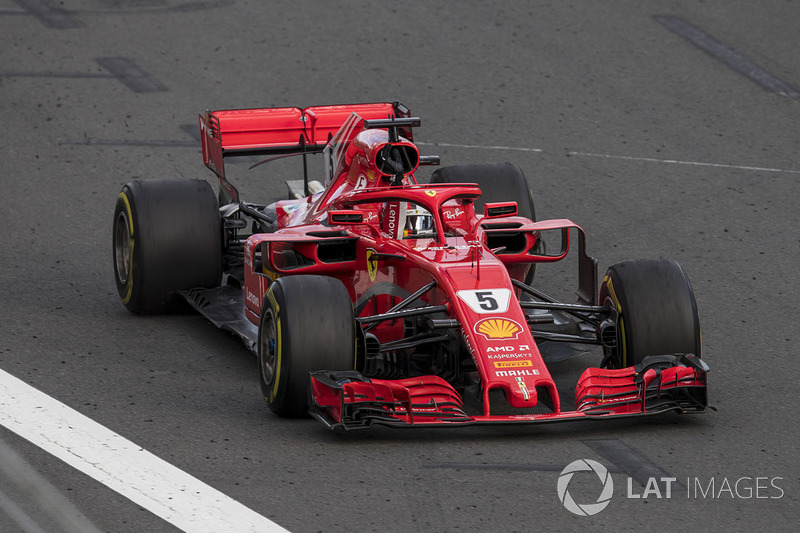 Sebastian Vettel, Ferrari SF71H, 1st position, punches the air in celebration after crossing the finish line