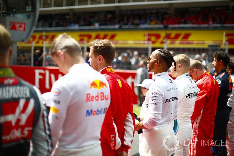 Max Verstappen, Red Bull Racing, Sebastian Vettel, Ferrari, Lewis Hamilton, Mercedes AMG F1, and Valtteri Bottas, Mercedes AMG F1, on the grid for the national anthem