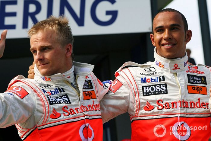 Pole sitter Lewis Hamilton, McLaren in parc ferme with Heikki Kovalainen, McLaren