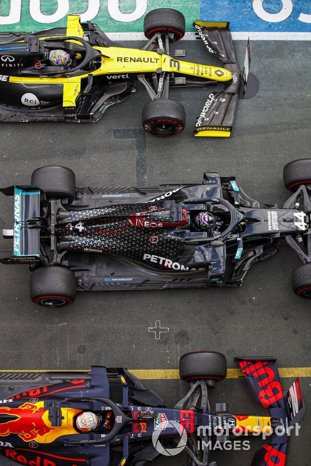 Lewis Hamilton, Mercedes F1 W11, 1st position, Max Verstappen, Red Bull Racing RB16, 2nd position, and Daniel Ricciardo, Renault F1 Team R.S.20, 3rd position, in parc ferme 