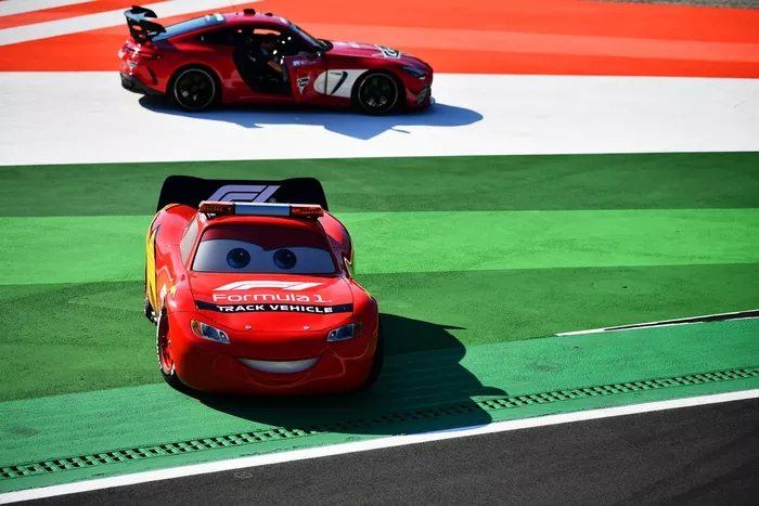 Cars and Lightning McQueen liveried Track Vehicles on track