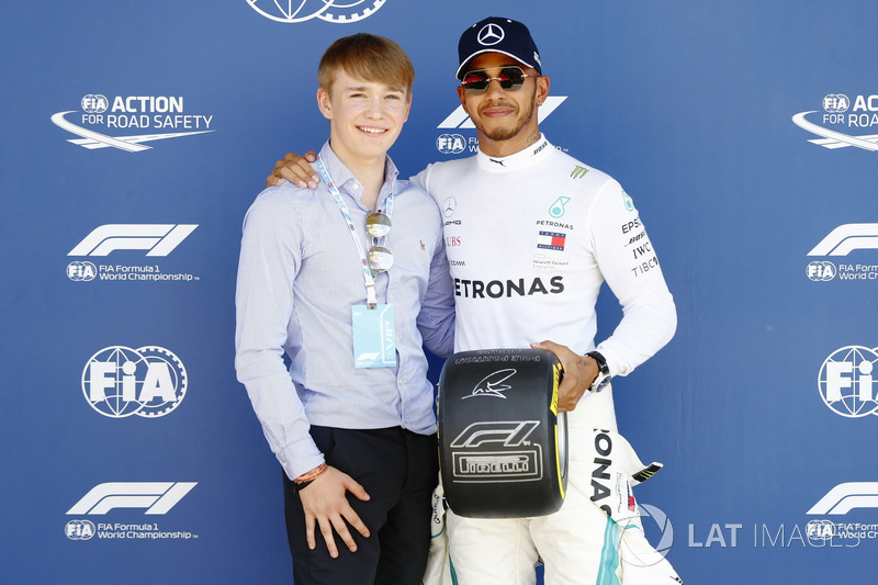 Billy Monger presents pole man Lewis Hamilton, Mercedes AMG F1, with the Pirelli Pole Position Award