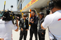 Actress Carina Lau and Fernando Alonso, McLaren, are interviewed