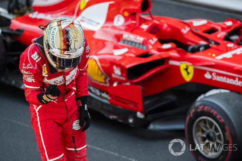 El ganador Sebastian Vettel, Ferrari