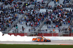 Brad Keselowski, Team Penske Ford, celebrates after winning